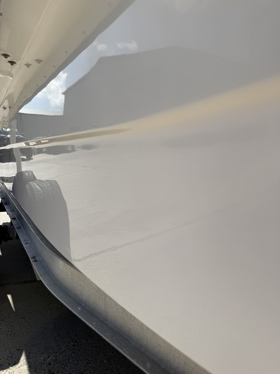 Boat hull after paint correction and ceramic coating